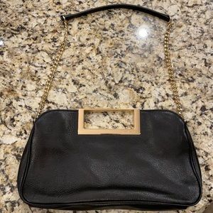 Michael Kors black and gold clutch, great condition